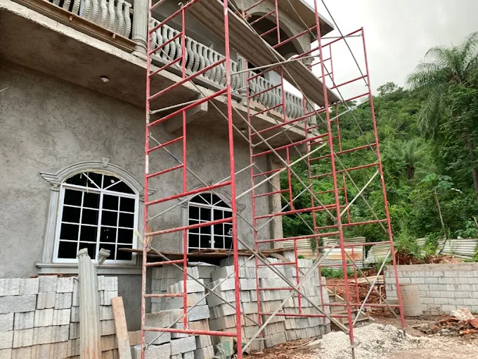 Exterior finishing access by Island Woods & Development